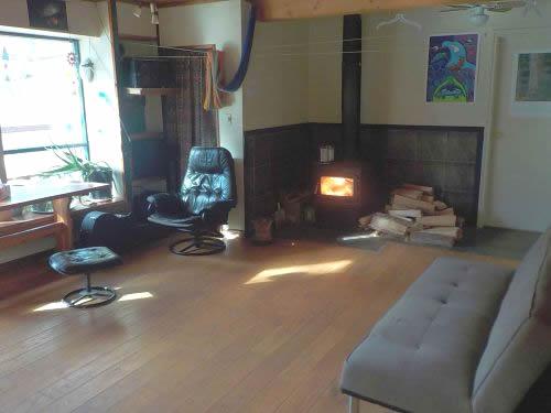living room and wood stove in the guesthouse